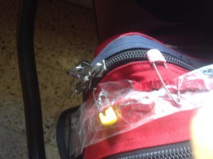 Backpack help together with nappy pins